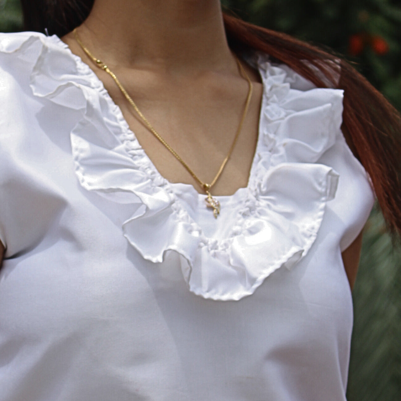 white ruffled neckline top